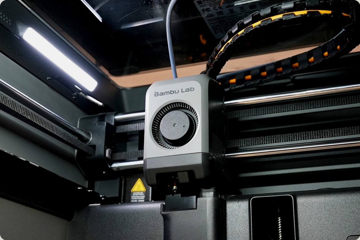 Inside a Bambu Lab printer making The Desk Shelf parts to order